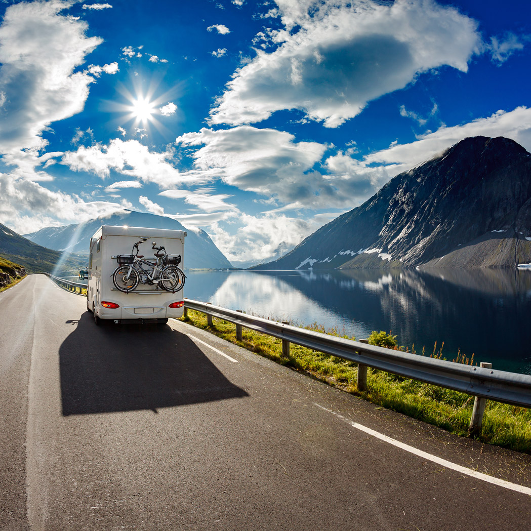 RV on the road on a sunny day